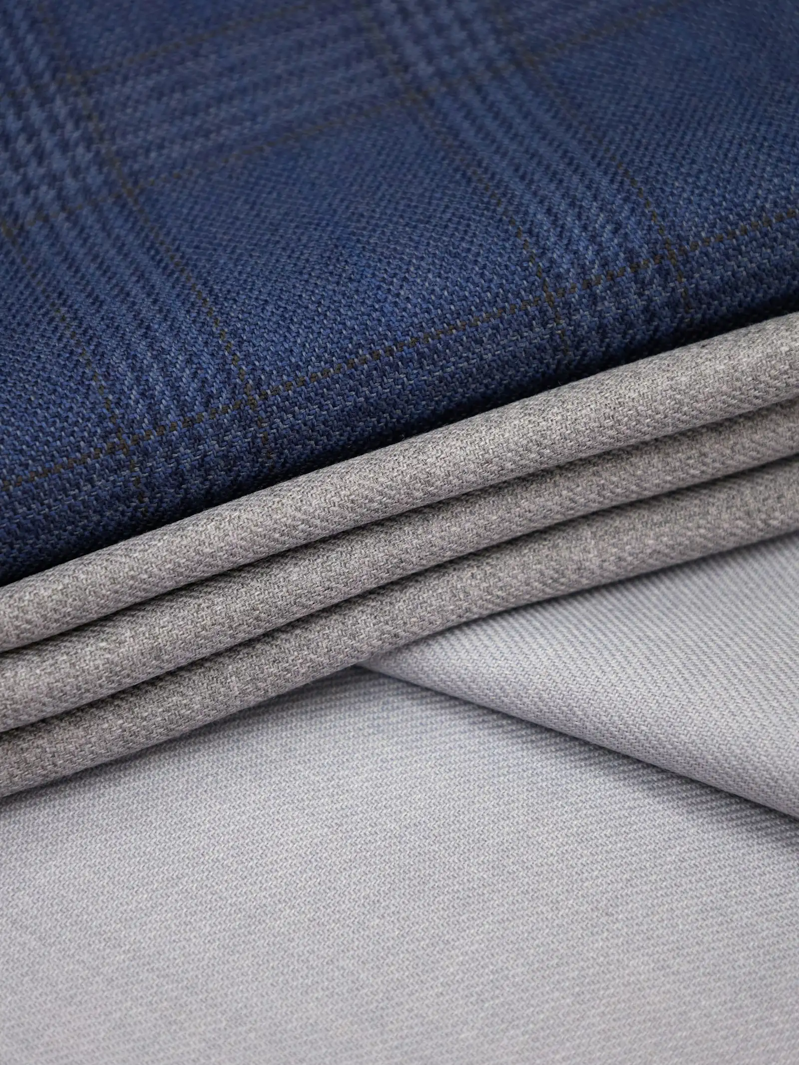 Folded wool suiting in navy and grey